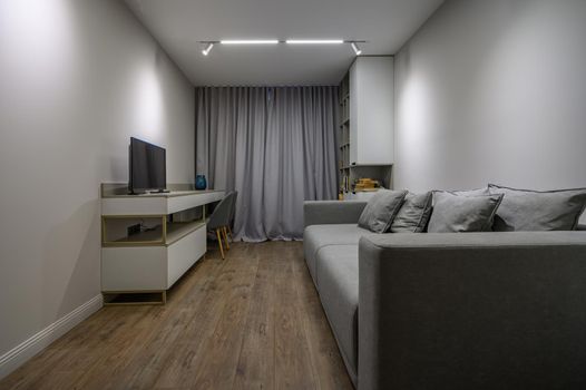 Cozy and luxury bedroom in shades of grey with elegant and modern details