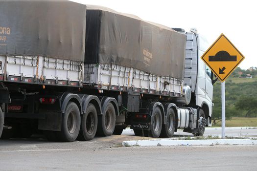 serra preta, bahia, brazil - september 13, 2022: truck traveling along the BA 052 highway in the city of Serra Preta.