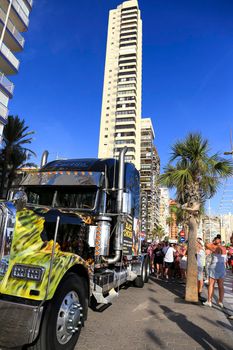 Alicante, Spain- September 11, 2022: Colorful large trailer in the middle of the street in Alicante, Spain