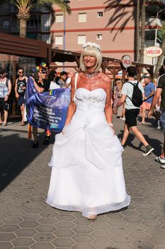 Benidorm, Alicante, Spain- September 10, 2022: People dancing and having fun at the Gay Pride Parade in Benidorm in September