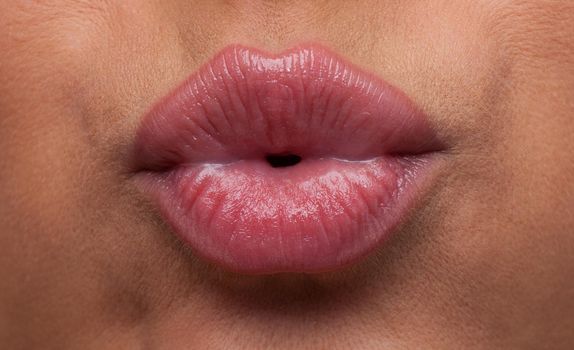 Beauty sexy woman lips blow close-up shot