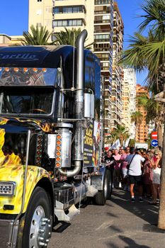 Alicante, Spain- September 11, 2022: Colorful large trailer in the middle of the street in Alicante, Spain