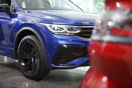 Cropped shot of new cars at dealership salon