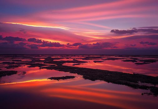 beautiful orange sunset on the shore of the beach. sunset sky.