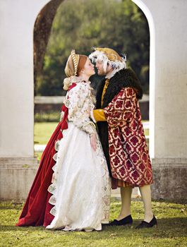 Royal romance. a royal couple spending time together at the gardens