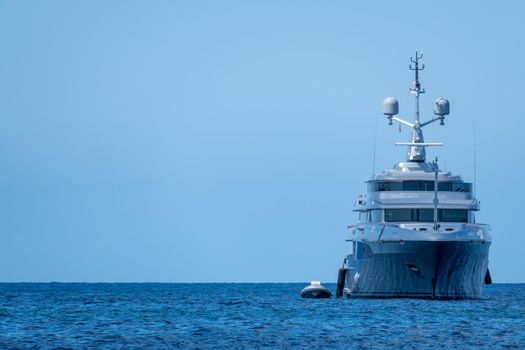 Grey yacht anchored in Formentera