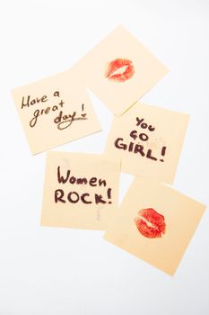 Vertical shot of different notes empowering women, international womens day concept