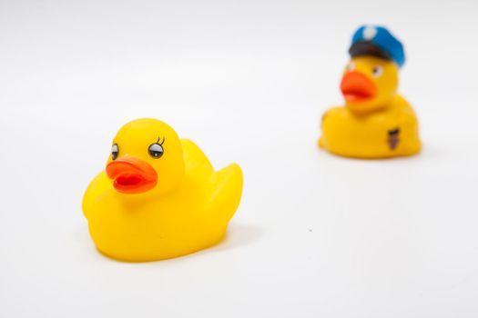 Criminal rubber duck getting away from rubber duck cop