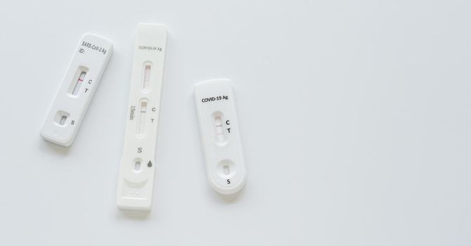 Coronavirus Covid-19 antigen test with various result on white background.