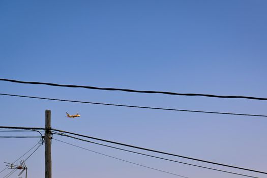 Ryanair plane flying through the sky, Ibiza, August 2022