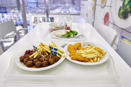 SAMARA, RUSSIA - JANUARY 11, 2022: Meatballs and French fries at ikea restaurant