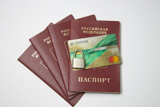 Russia, Syzran - FEBRUARY 27, 2022: sanctions against Sberbank. ban on leaving Russia, passports and bank cards under lock and key.