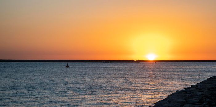 Beautiful sunset captured on Palm Jumeirah, Dubai, world's only man made island. Dubai, UAE. Outdoors