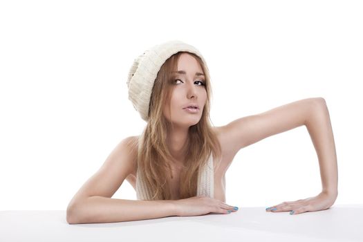 Young sexy girl smile in white cap - close breast with scarf