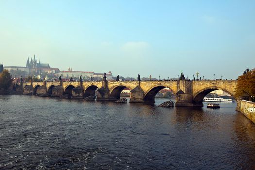 Karlov most - Prague historical bridge over vltava river