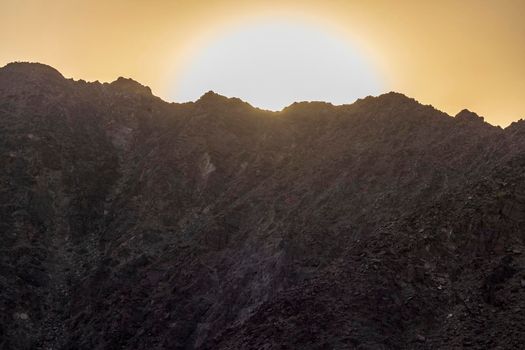 Shot of a dramatic sunset in mountainous area.