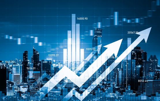 Financial graphs and digital indicators overlap with modernistic urban area, skyscrabber for stock market business concept. Double exposure.