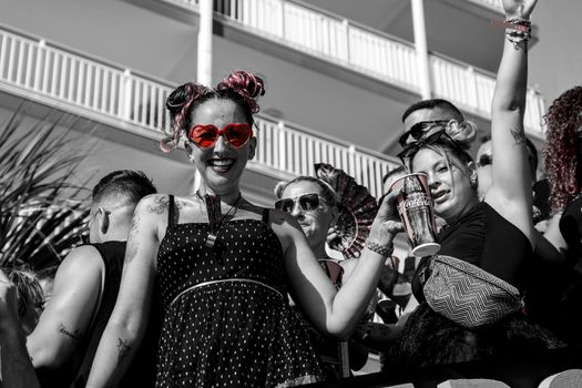 Benidorm, Alicante, Spain- September 10, 2022: People dancing and having fun at the Gay Pride Parade in Benidorm in September