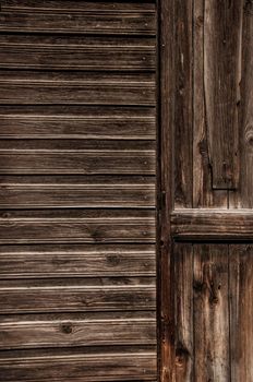 Natural brown barn wood floor / wall texture background pattern. Wood planks / boards are very old with a beautiful rustic look / style.