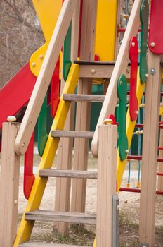 Colourful stairs of slide in playground.