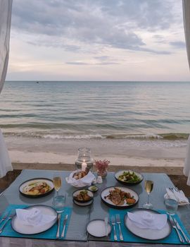 Dinner by candlelight on the beach in Thailand. Romantic dinner on the beach