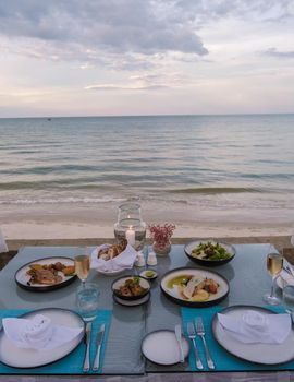 Dinner by candlelight on the beach in Thailand. Romantic dinner on the beach