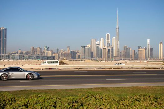 View of a Dubai city skyline on early morning hour. Tallest building in the world Burj Khalifa can be seen on the scene. Outdoors