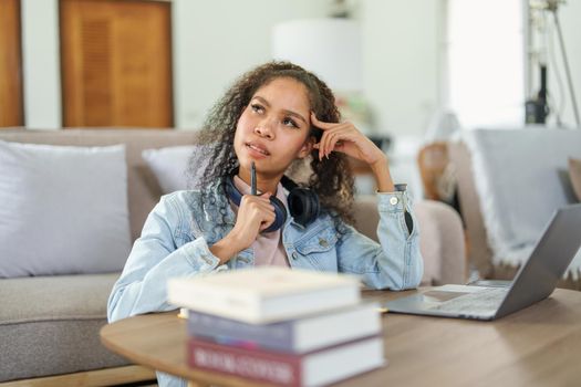 Portrait of African Americans using computers and notebooks to study online and showing doubtful faces at lessons they have learned.