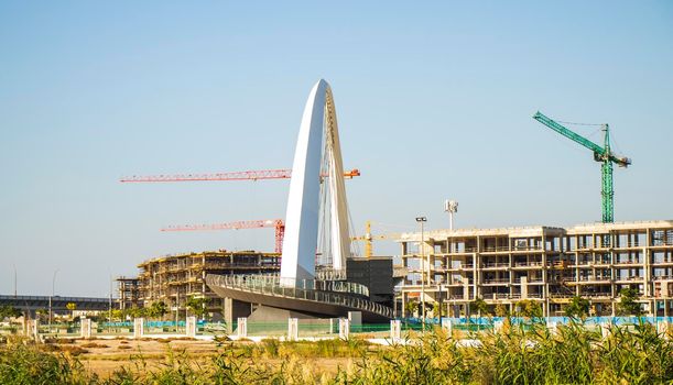 View of a well known landmark of Dubai, Tolerance bridge. Shot made from safa park