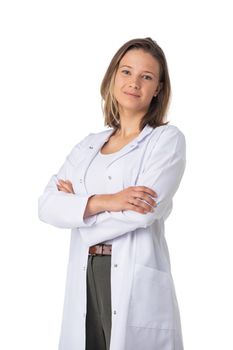 Portrait of happy young doctor woman standing with arms crossed isolated on white background