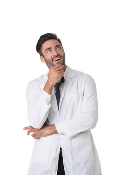 Young male medical doctor with stethoscope thinking holding chin isolated on white background studio portrait