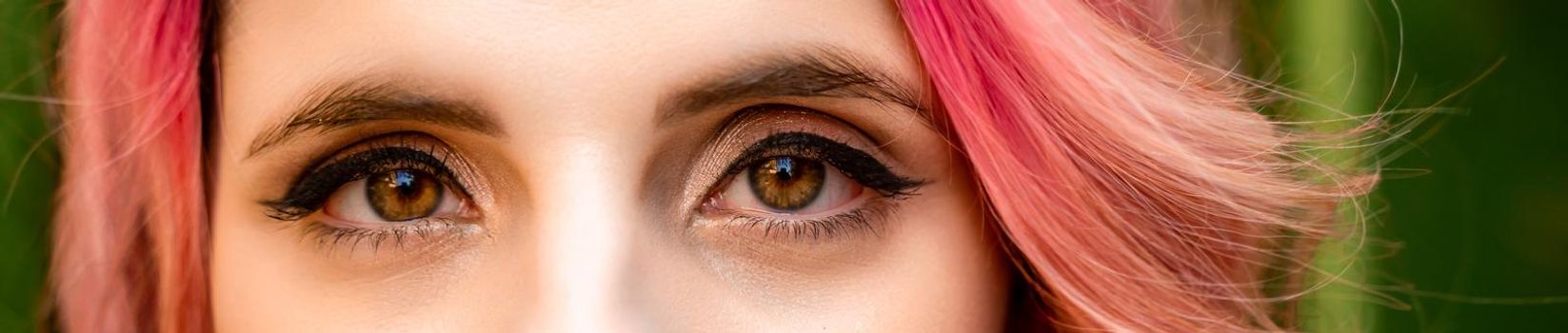 Macro shot of woman's eye with transparent makeup. Expressive look. sight