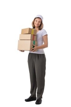 Full length portrait of delivery woman in white cap, t-shirt giving order boxes isolated on white background. Female courier step, cardboard box. Receiving package.