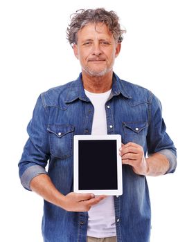 The only tablet I trust. Studio shot of a mature man holding up a digital tablet isolated on white