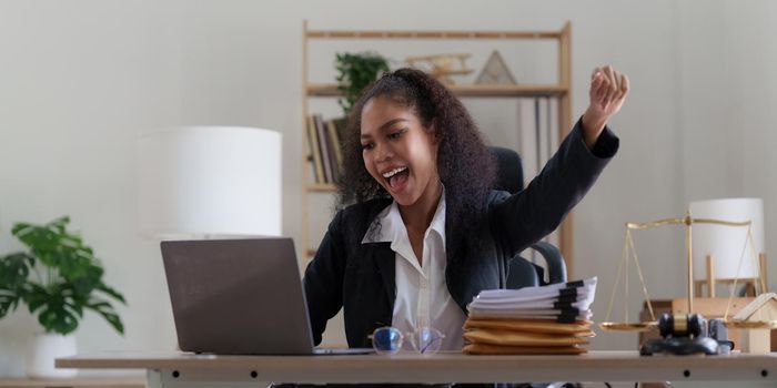 Lawyer business woman do winner gesture. lawyers won the case concept.