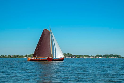 Traditional Frisian wooden sailing ship in a yearly competition in the Netherlands