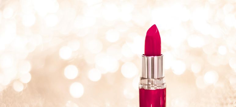 Cosmetic branding, sale and glamour concept - Maroon lipstick on golden Christmas, New Years and Valentines Day holiday glitter background, make-up and cosmetics product for luxury beauty brand