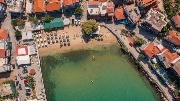 Top daytime aerial view to the town beach in Skala Marion beach at Thassos island, Greece