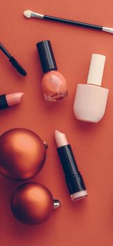 Cosmetic branding, fashion blog cover and girly glamour concept - Make-up and cosmetics product set for beauty brand Christmas sale promotion, vintage orange flatlay background as holiday design