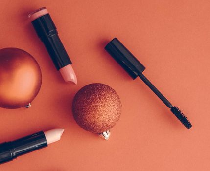 Cosmetic branding, fashion blog cover and girly glamour concept - Make-up and cosmetics product set for beauty brand Christmas sale promotion, vintage orange flatlay background as holiday design