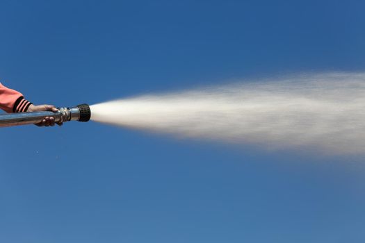 Spray water on truck during fire training in the industry