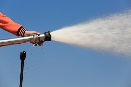 Spray water on truck during fire training in the industry