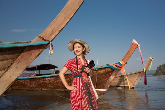 Tourist woman enjoying travel vacation in Krabi, Thailand.