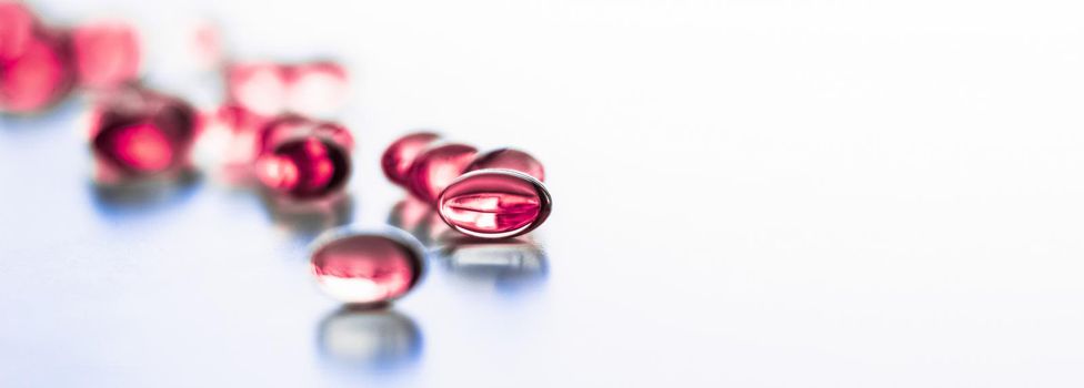 Pharmaceutical, branding and science concept - Red pills for healthy diet nutrition, supplements pill and probiotics capsules, healthcare and medicine as pharmacy and scientific research background