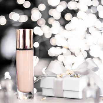 Cosmetic branding, Christmas glitter and girly blog concept - Holiday make-up foundation base, concealer and white gift box, luxury cosmetics present and blank label products for beauty brand design