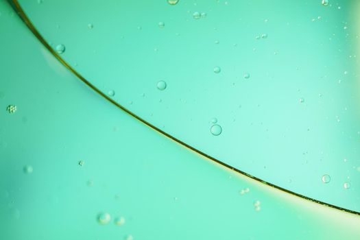 abstract blue background of oil droplets macro photography