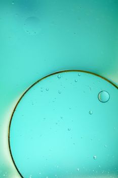 abstract blue background of oil droplets macro photography