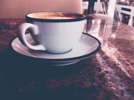 Brunch in Paris, drinks menu and vintage recipe concept - Cappuccino for breakfast in cafeteria, coffee cup on table in parisian cafe