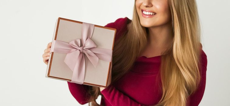 Birthday, Christmas or holiday present, happy woman holding a green gift or luxury beauty box subscription delivery isolated on white background, portrait