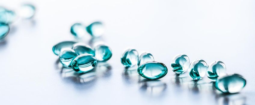 Pharmaceutical, branding and science concept - Blue pills for healthy diet nutrition, supplements pill and probiotics capsules, healthcare and medicine as pharmacy and scientific research background